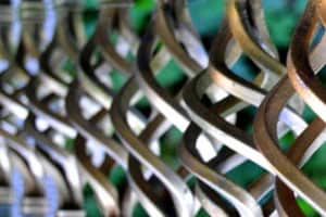 Fence Repairs - Fence Repairs - decorative helical metal parts of fence